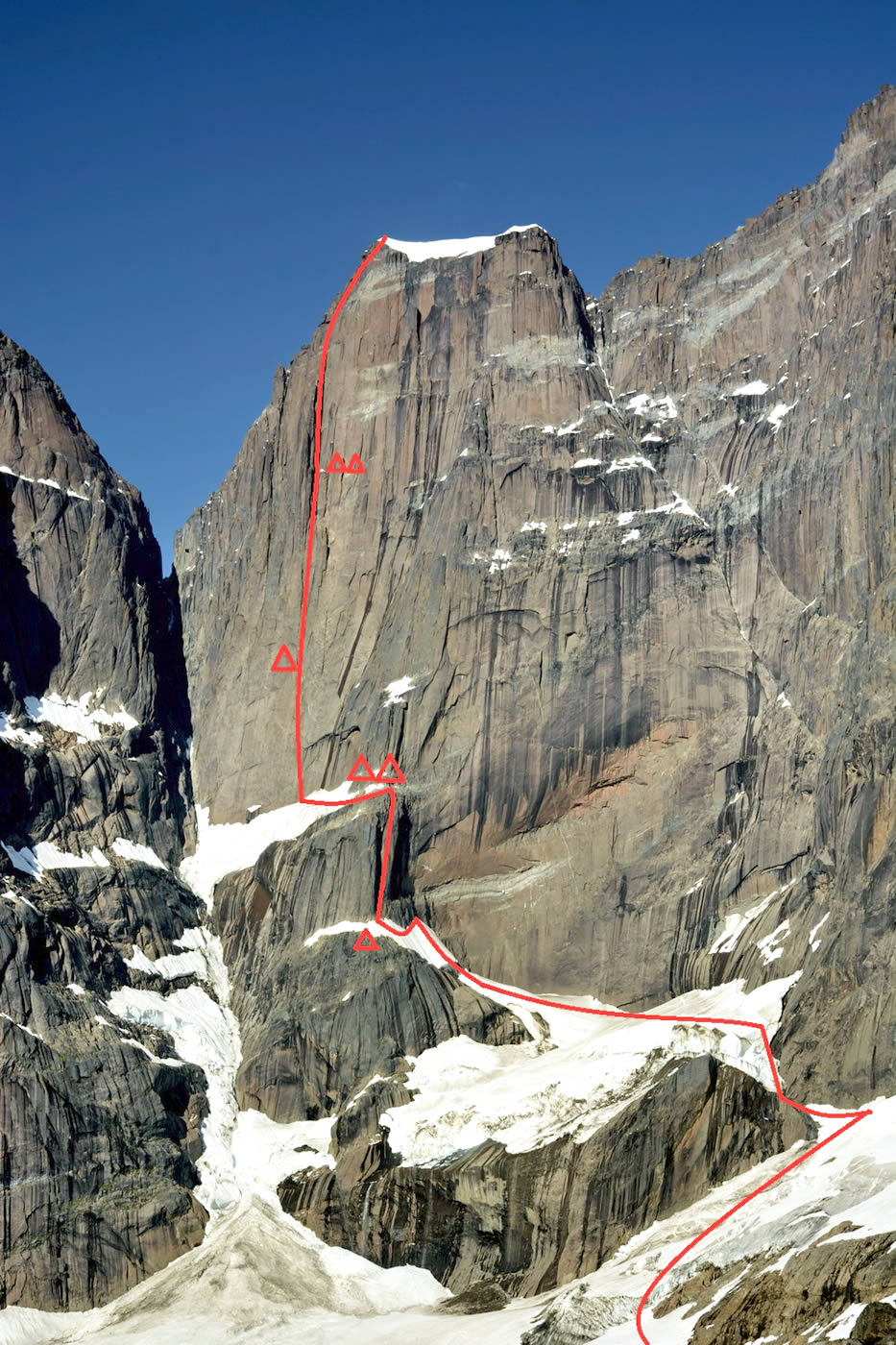 10-routeline This photo has the team's new route, Metrophobia (7a A2+ 120-degree ice 1700m), marked in red on the west face of Greenland's Apostelens Tommelfinger (2315m).