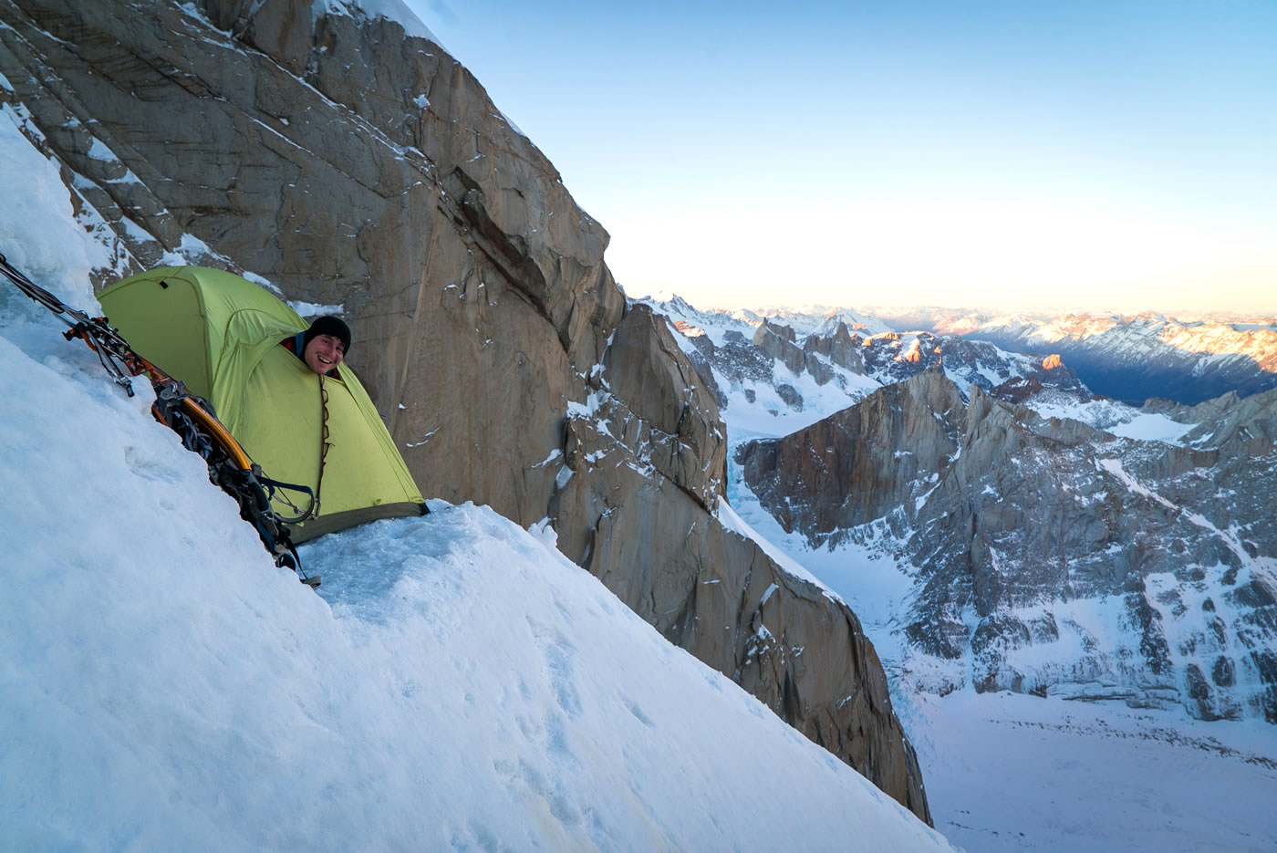 Leclerc in the tent at the one bivy he and Austin Siadak made at a 45-degree snowfield halfway up the route. The pair thought they would be able to dig a nice platform easily in the snow slope, but there ended up being about 6 inches of snow on top of extremely hard ice, and it took them two hours to chop out the ledge. [Photo] Austin Siadak