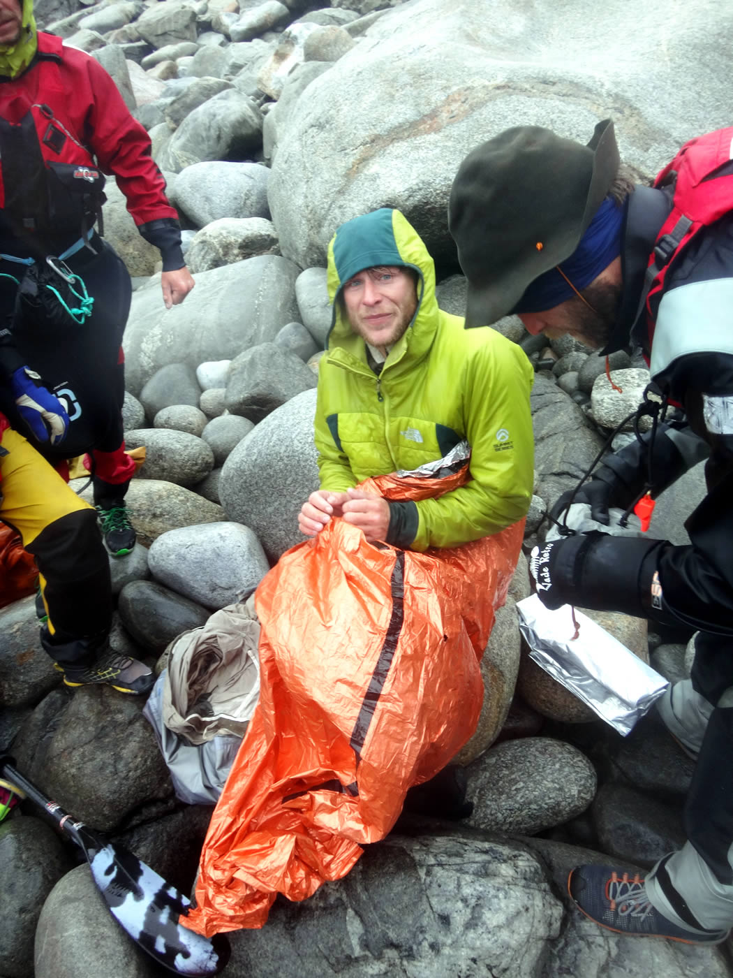 Jerome Sullivan battles hypothermia on shore after capsizing three times in his kayak while paddling through rough water that was only 3 degrees Celsius. Antoine Moineville is on the right. [Photo] Fabio Lupo Laddy Ledergerber and Antoine Moineville. [Photo] Silvan Schuepbach
