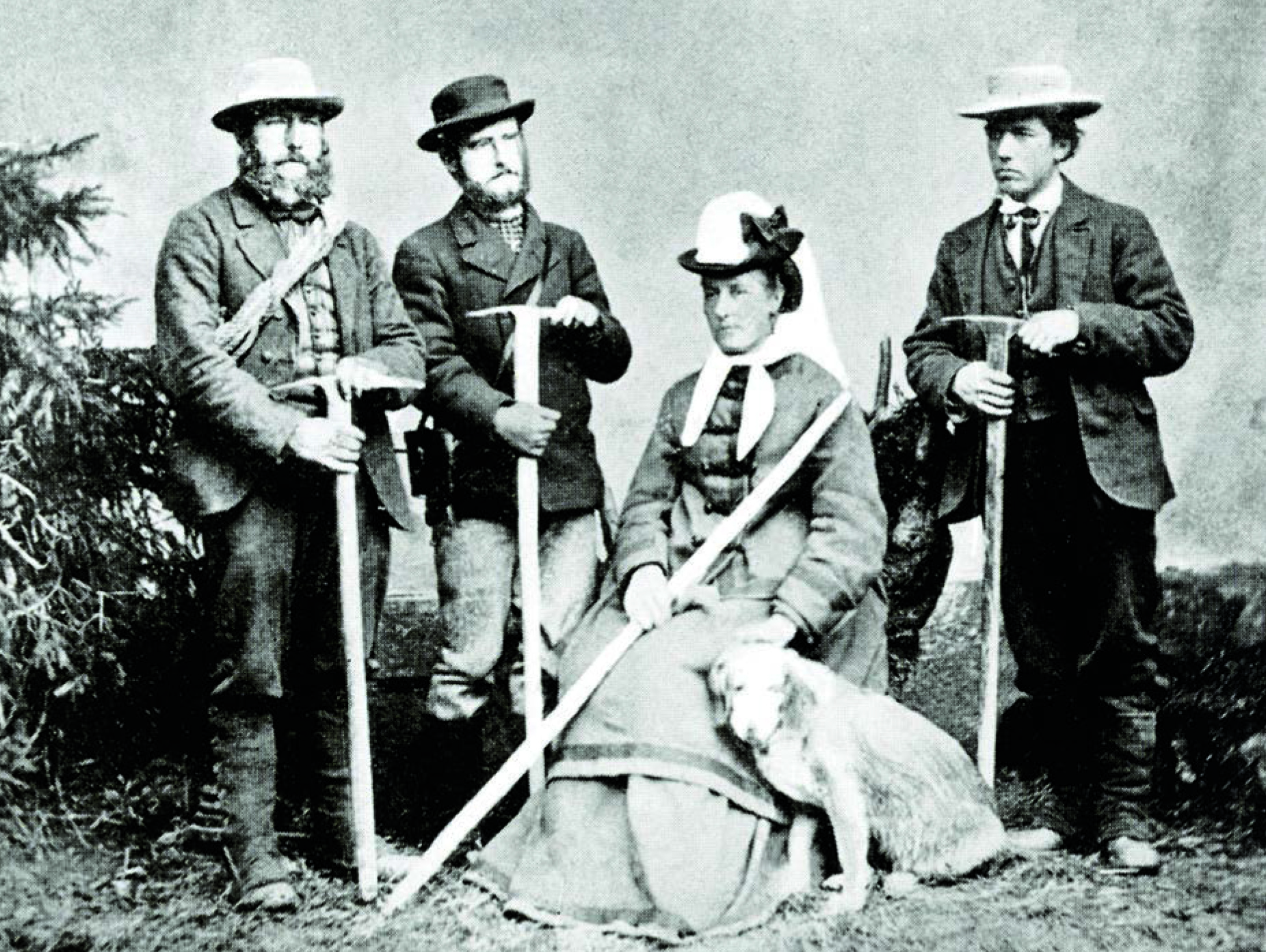 William Coolidge with his aunt, Meta Brevoort, their guides Christian Almer (far left) and Ulrich Almer (Christian's son, second left,) and dog Tschingel, circa 1874. [Photo] Courtesy of the Alpine Club