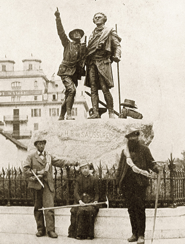 Emile Rey, Katharine Richardson and J.B. Bich at the foot of the statue of Horace Benedict de Saussure and Jacques Balmat, Chamonix, France, 1890. [Photo] Courtesy of the Alpine Club