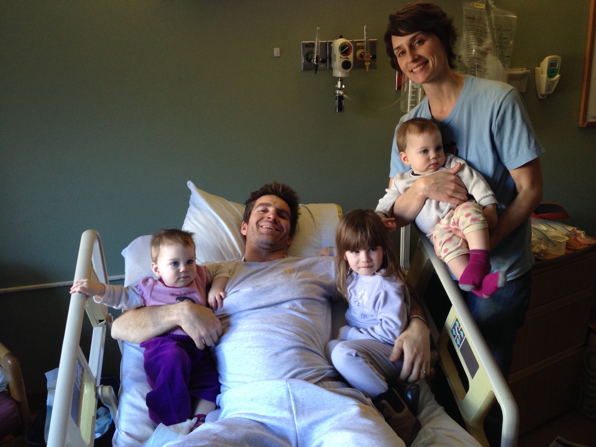 Alex McKiernan in the hospital with his family four days after the car crash. I have no memory of this, he said. [Photo] Alex McKiernan collection