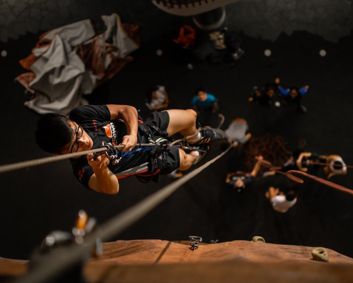Practicing with jumars in the university building. [Photo] Lim Joel