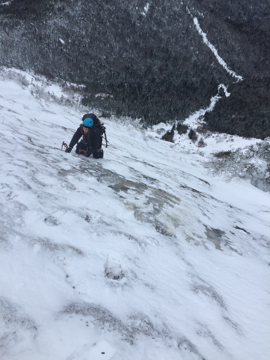 Katie Ives, on the North Face (the common name for the northwest face) of Gothics, Adirondacks. [Photo] Kevin B. MacKenzie