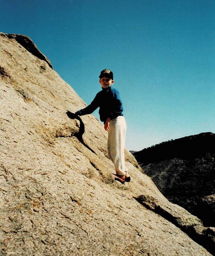 Derek Franz scrambling, ca. 1990. [Photo] Derek Franz