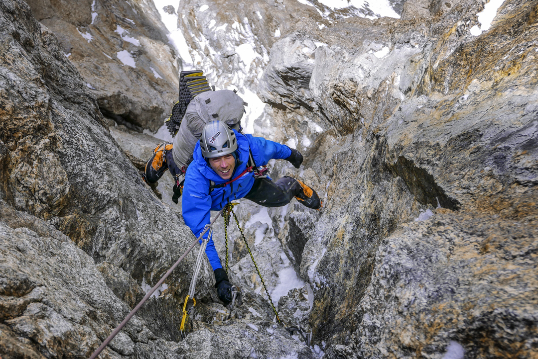 Urban Novak following the second pitch on the second day of All or Nothing. It proved steeper than expected, and climbing with sacks was an extra challenge for the two followers, less fun than leading. [Photo] Marko Prezelj