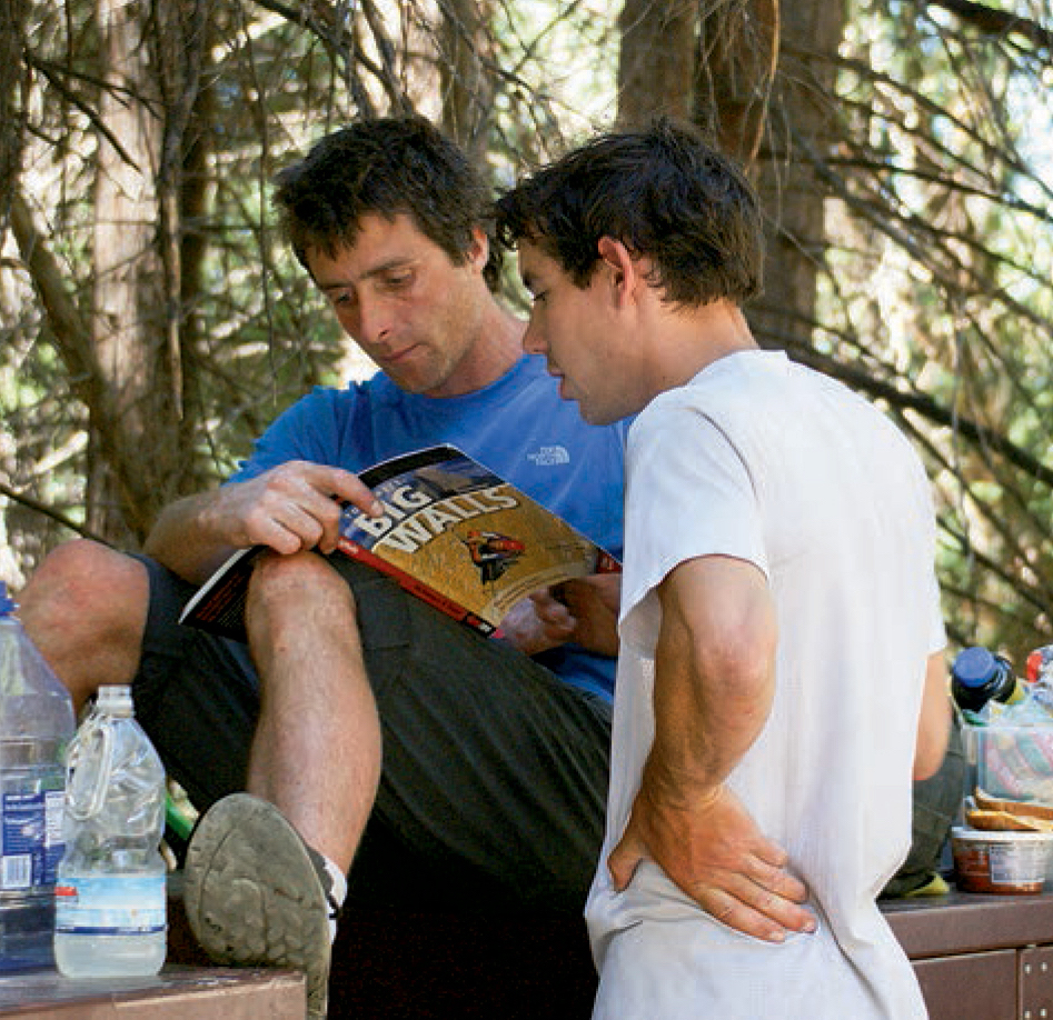 The late Sean Leary (1975-2014) and Honnold check the topo of Lurking Fear, during a 23-hour (roped) linkup of The Nose, the Salathe Wall and Lurking Fear (ca. eighty-five pitches) on El Capitan, Yosemite.  [Photo] Tom Evans
