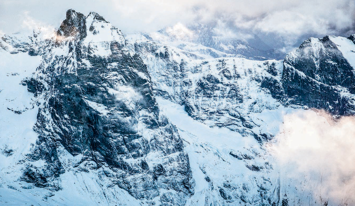 The east face of Southeast Mox Peak, also known as Southeast Spire. For a full account of the first ascent of the Great Wall of No Name Peak, see Alpinist 13. [Photo] John Scurlock