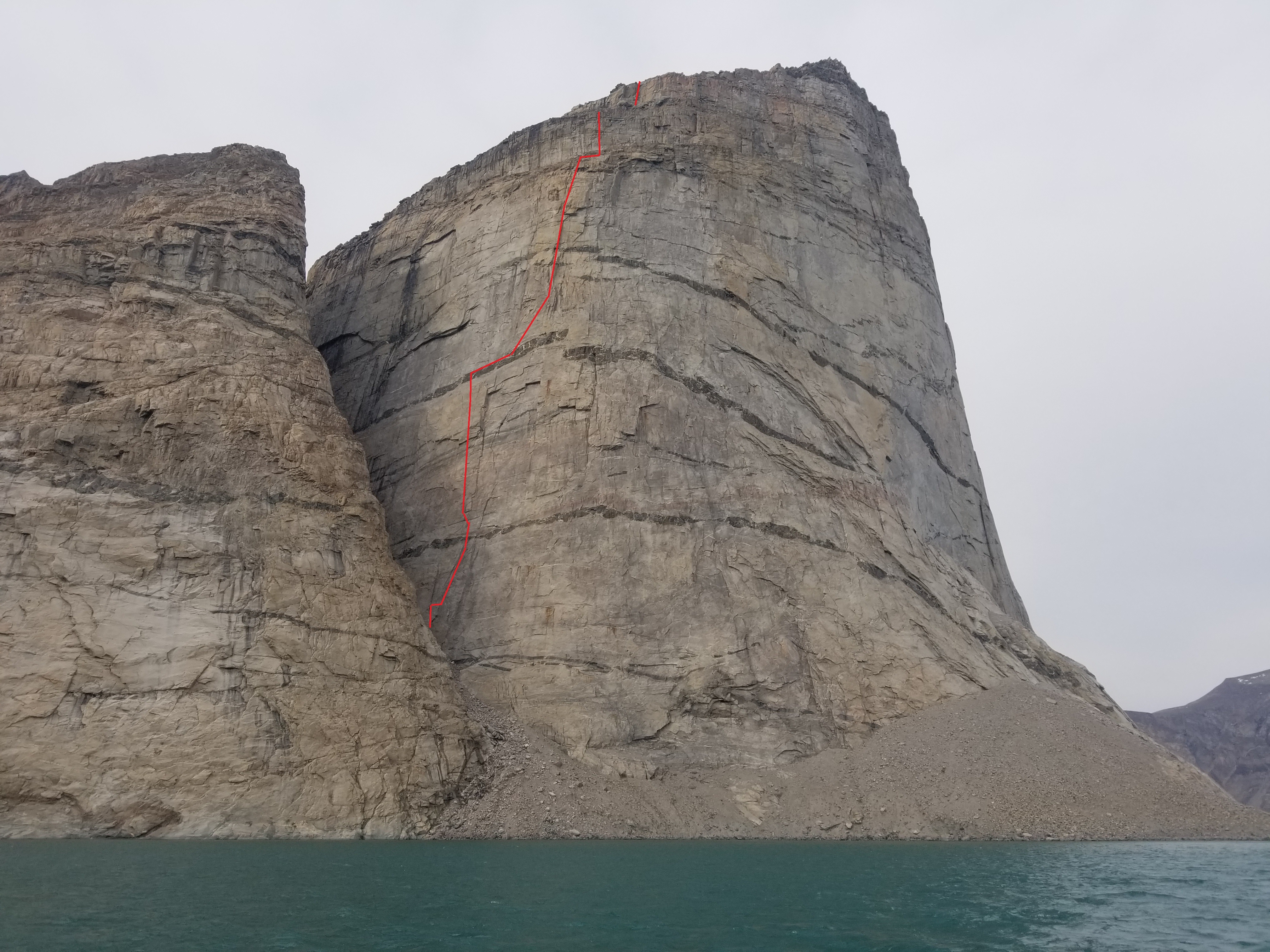 Marooned at Midnight (VI A3 5.11 R, 17 pitches, 700m) climbs a formation the Inuit call Umiguqjuaq. [Image] Sam England and Ryan Little