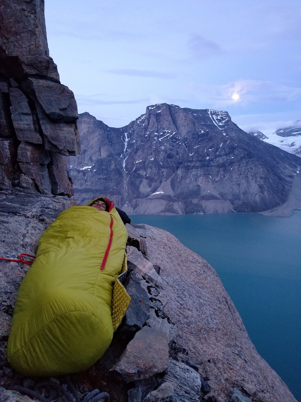 Ryan Little settles in under the moon near the top of the wall. [Photo] Sam England