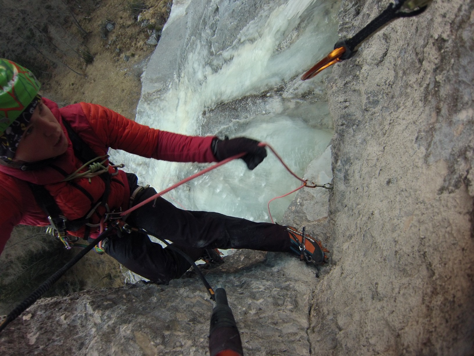 Ballard makes a clip while rope-soloing the first ascent of Dust in the Wind. [Photo] Tom Ballard