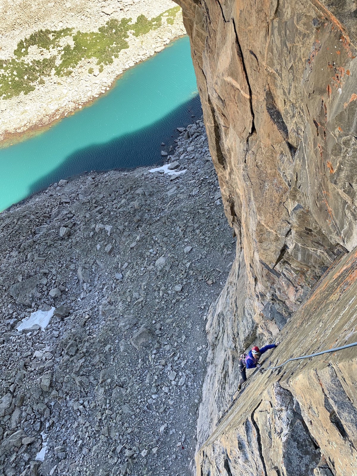 Clark enjoying the exposure on Jaded Lady, Mt. Hooker, Wind River Range. [Photo] Will Stanhope