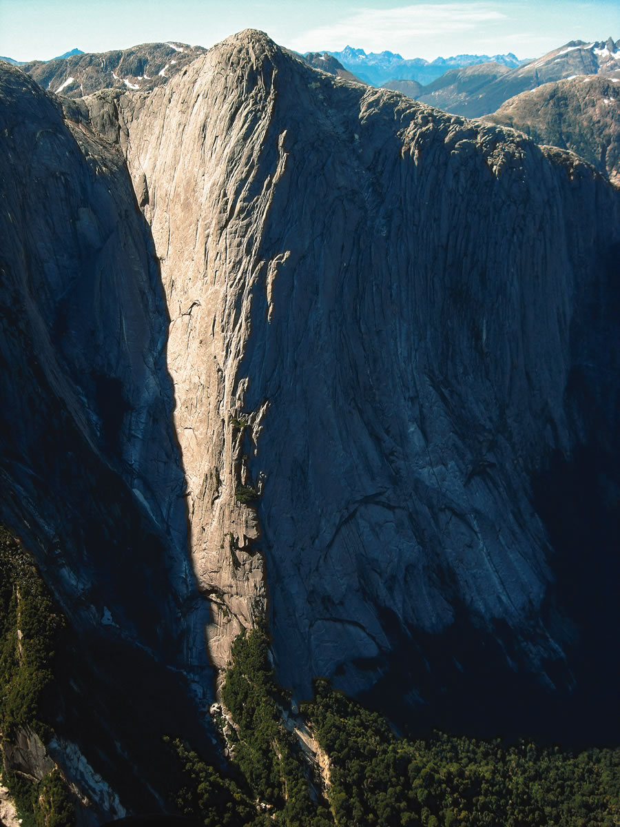 El Hermano (ca. 4,500), Chile. In 2014 Libby Sauter's team mostly followed the sun-shadow line, and then cut to the right a few hundred feet from the top. [Photo] Doug Tompkins