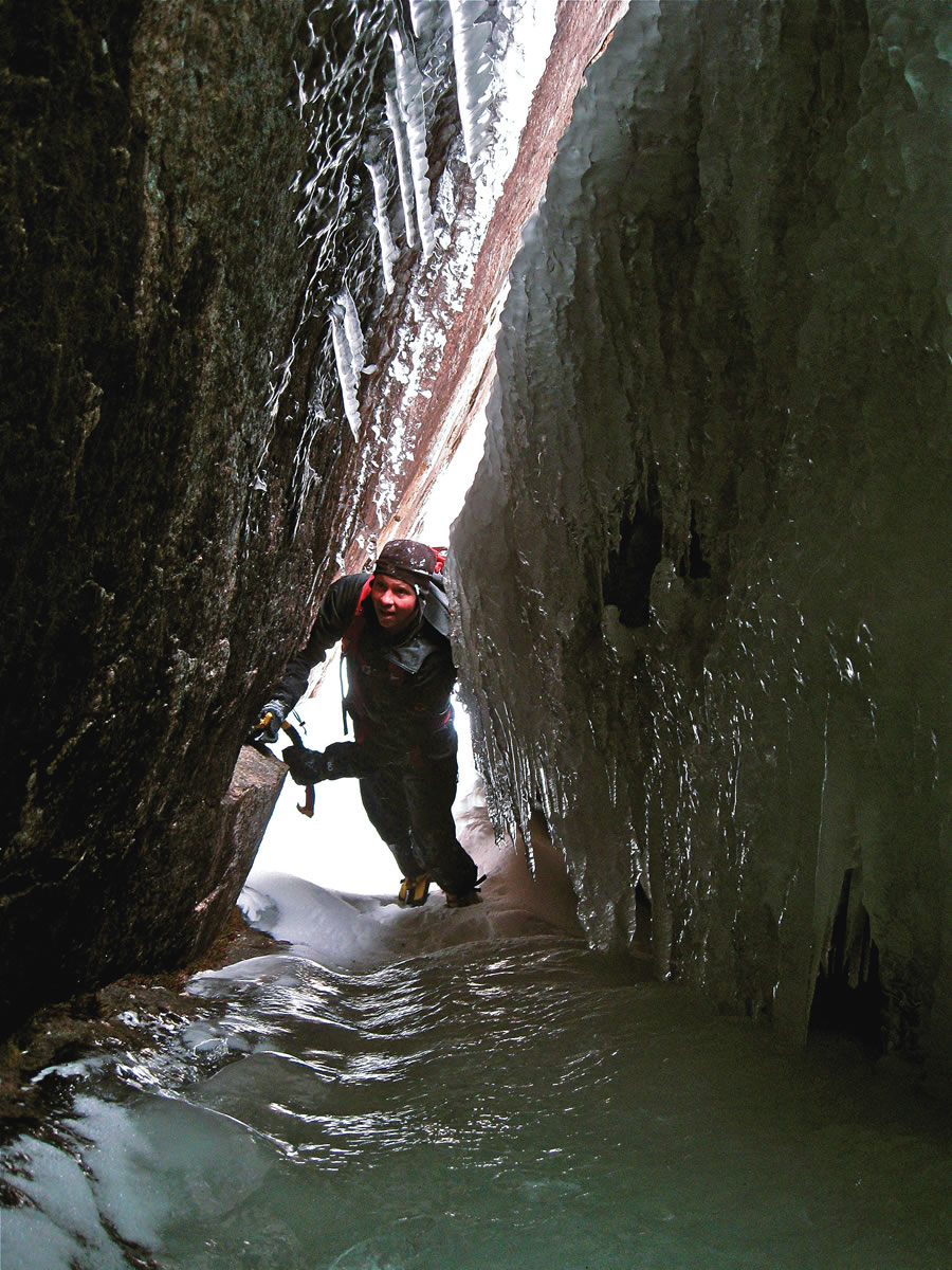 beyond-the-guide-5 Mike Garity exploring one of the tucked-away ice climbs on Mt. Webster.