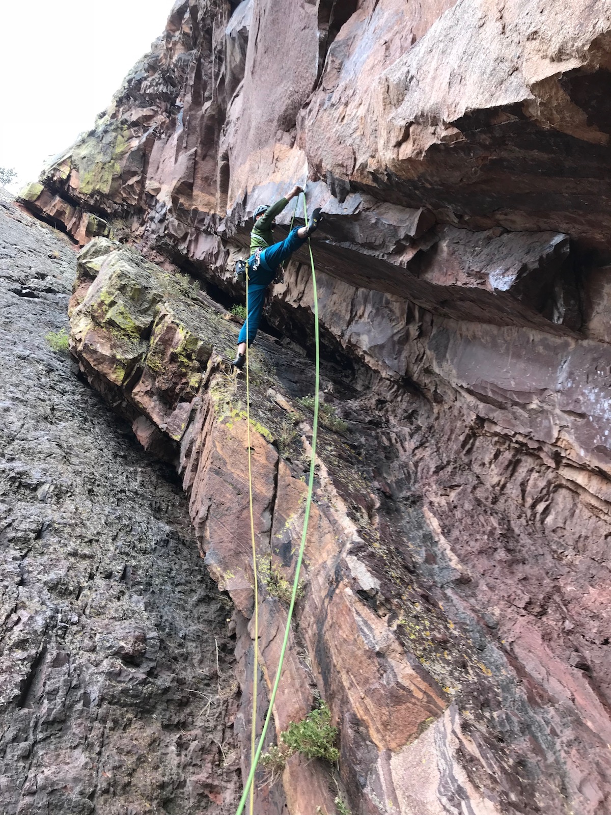 Corey Flynn starts the first pitch of Scary Canary (5.12b/c R), Eldorado Canyon, Colorado. [Photo] Chris Van Leuven