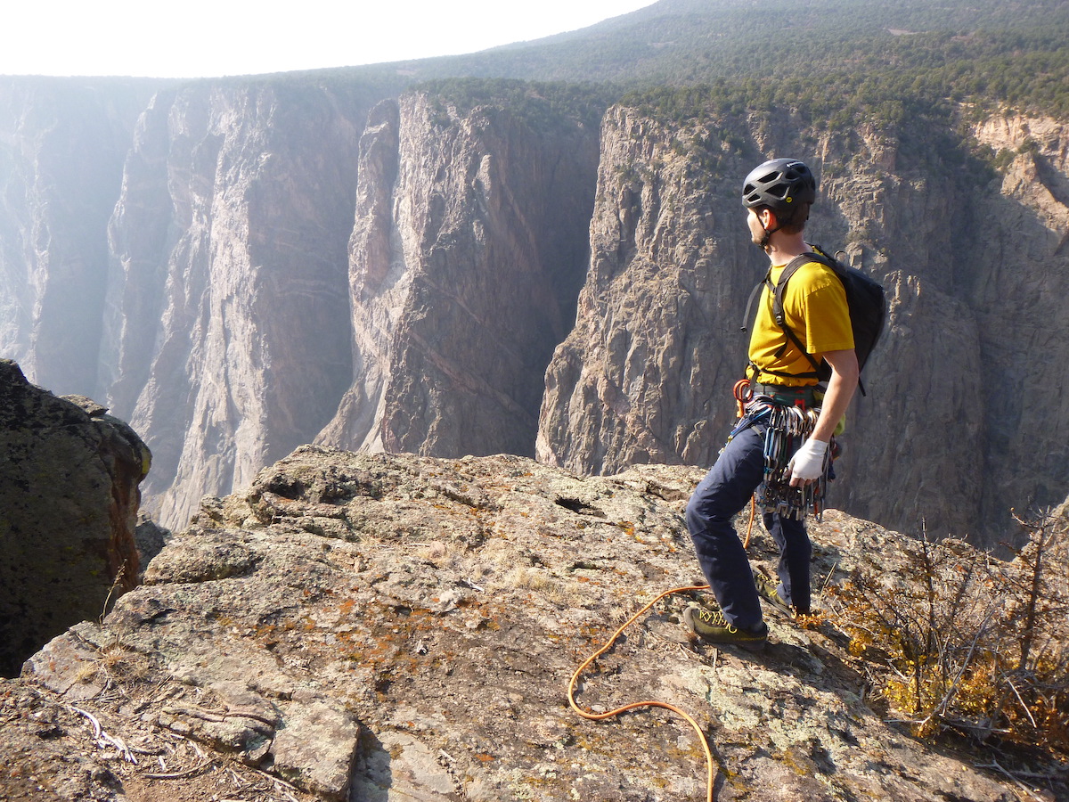 Derek Franz on the rim of the Black Canyon in 2020 after finishing a route during which he wore his new Black Diamond Crack Gloves for the first time. [Photo] Morgan Williams