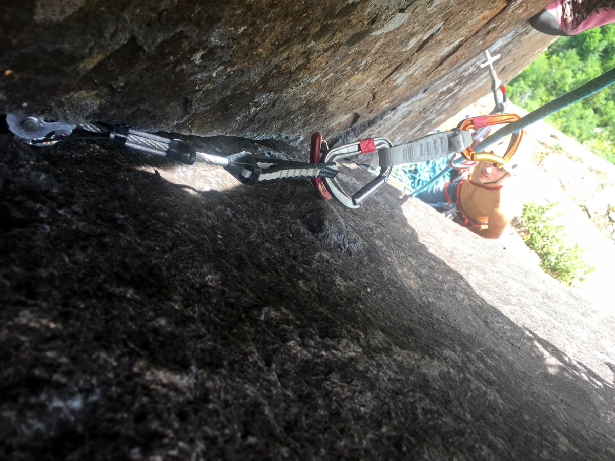 Looking down on a perfectly placed #5 Ultralight Master Cam high on The Fastest Gun (5.10b, 500'). Ryan Sengebush is belaying. [Photo] Chris Van Leuven