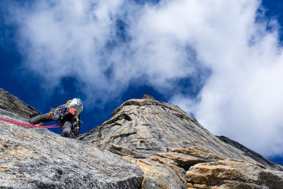 Leading on unexplored terrain on the east face of Caliban in Alaska’s Arrigetch Range. Gus Barber, Lang Van Dommelen and Chris Williams’ new route, which they are simply referring to as the East Face for now, is a 2,500-foot Grade IV+ 5.11. [Photo] Lang Van Dommelen