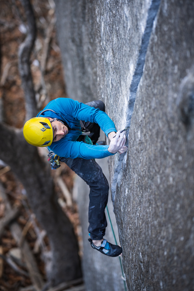 Carlo Traversi places protection on Magic Line (5.14c), Yosemite Valley. [Photo] Christian Adam / Black Diamond
