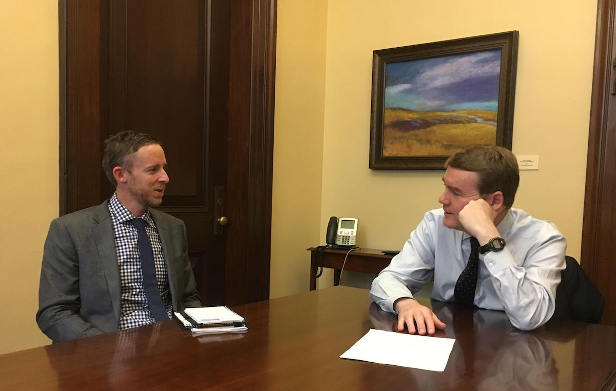 Tommy Caldwell visits with Senator Michael Bennet (D-Colorado). I didn't get any work done while you were up there [on the Dawn Wall], Bennet said. The senator offered advice for approaching his Republican counterparts and pointed out some issues that will help the cause for public lands. Where we really need help is with funding [for public lands] and getting people in agreement on climate change, he said. [Photo] Derek Franz