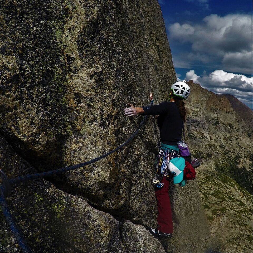 Jackie Niles traverses into the crux. [Photo] Nathan Arganbright
