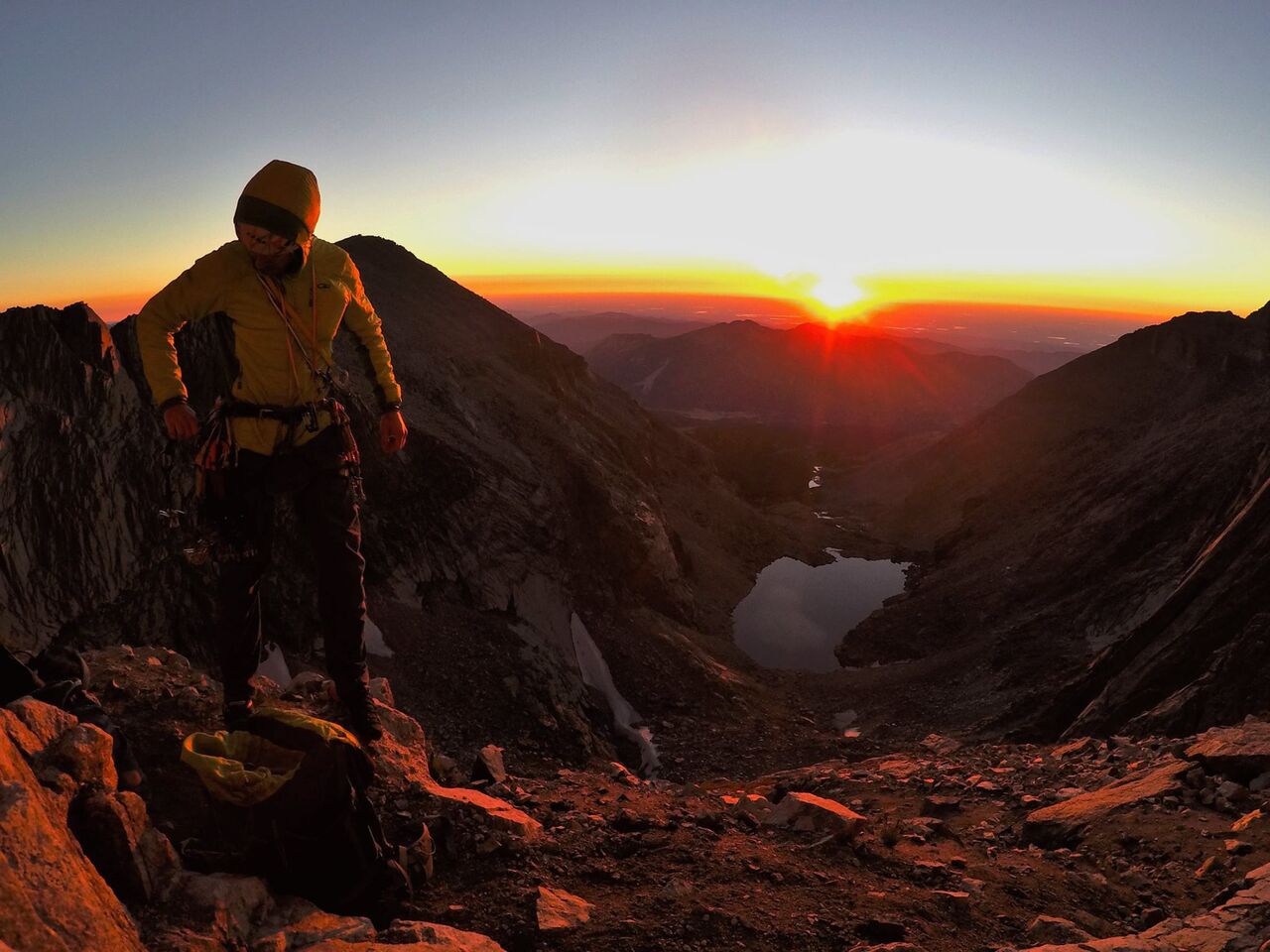 Adam Reke racks up for his debut on the Diamond of Longs Peak (14,255'), via the Casual Route (IV 5.10a). [Photo] Jackie Niles