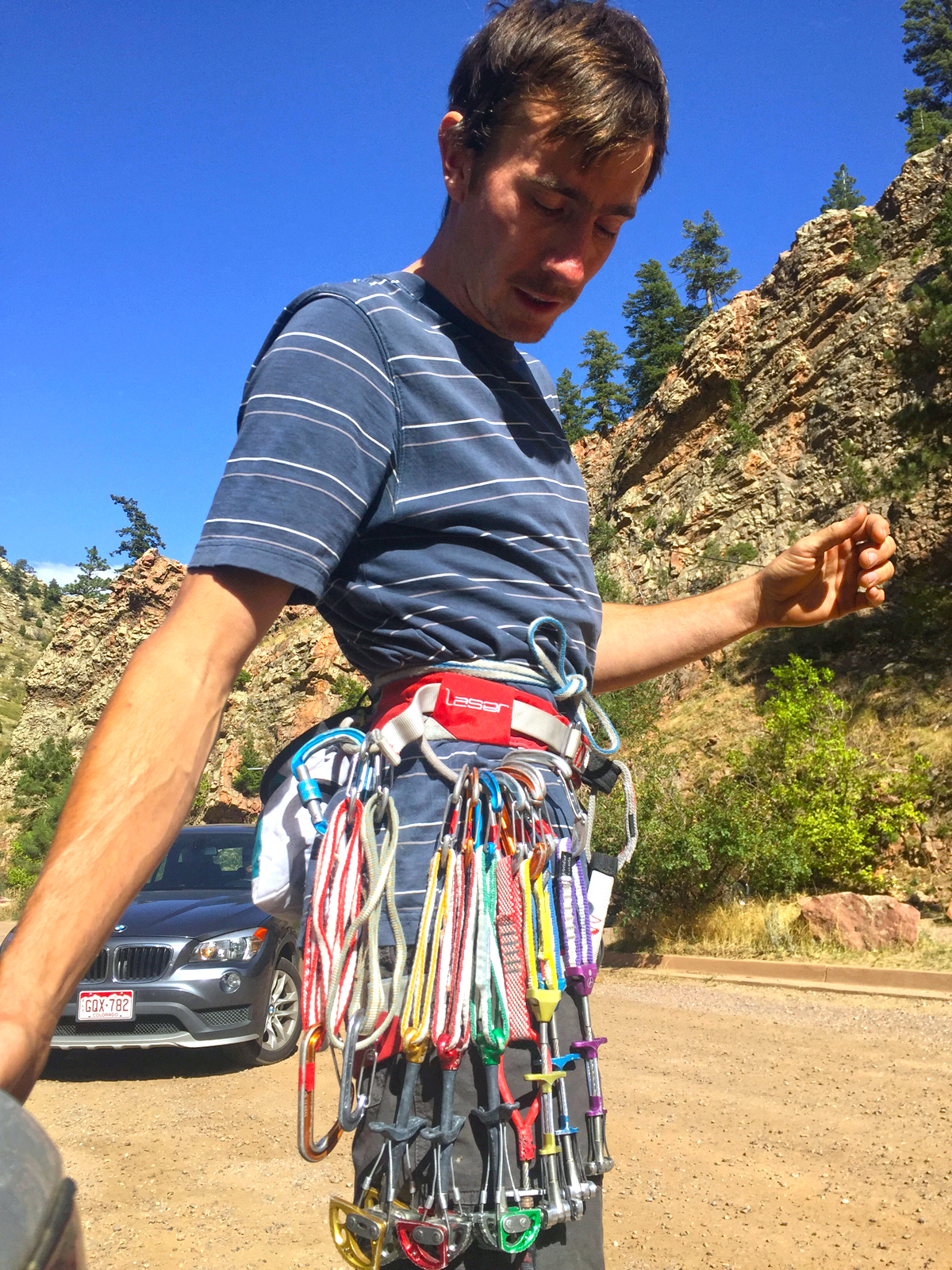 Bennett shows off the slimmed-down rack he used later that day on the Naked Edge (5.11b, 460'). [Photo] Chris Van Leuven