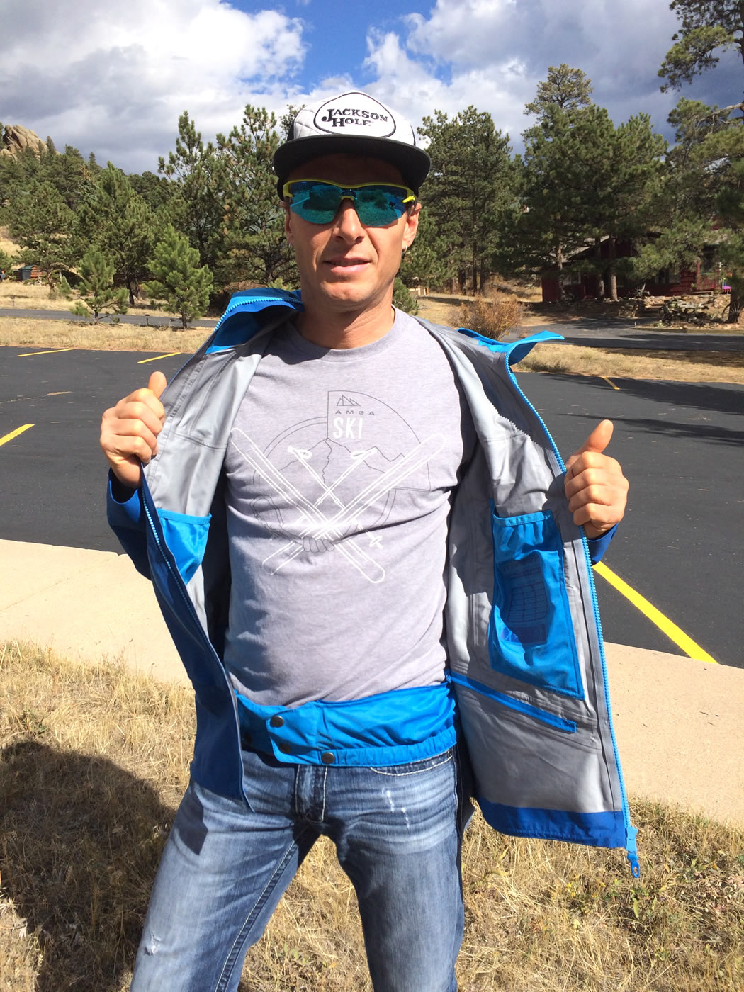 The author showing the removable snow skirt and internal water bottle/glove pockets. [Photo] Chris Wood