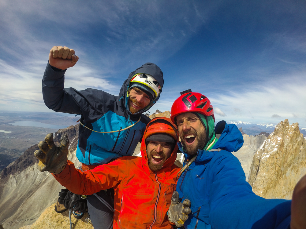 The team celebrates on top of the Central Tower on Day 15. [Photo] Courtesy of Nico Favresse, Siebe Vanhee and Sean Villanueva O'Driscoll