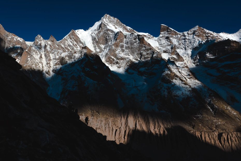 Hayden Kennedy, Marko Prezelj and Manu Pellissier descend into shadows after the first ascent of Light Before Wisdom. [Photo] Urban Novak