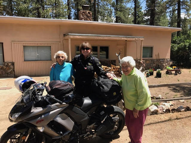 Paula Crenshaw, Jean's niece, wrote of this photo, which was taken ca. 2014: These are the last photos taken of them when I rode my bike down to visit. Jean was pestering me to take her for a ride on the back. I was too afraid she'd fall off! But it shows her famous smile everyone loved. Helen died a few months later. [Photo] Courtesy of Paula Crenshaw