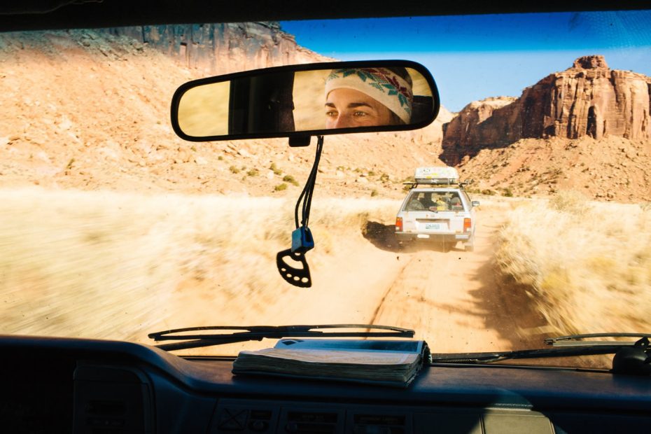 Mike jumps out of his 1992 Subaru Loyale to open the cattle gate marking the entrance to the dirt road; we slip in and let the minivan full of friends behind us latch it closed. Our ragtag caravan rallies toward Broken Tooth Wall, a cloud of dust marking our bumpy path. The guidebook lies open on the dash, red dirt bookmarking our objectives for the day, and later, our stories shared around the evening campfire. [Photo] Forest Woodward @forestwoodward @jabegg @hollandmike