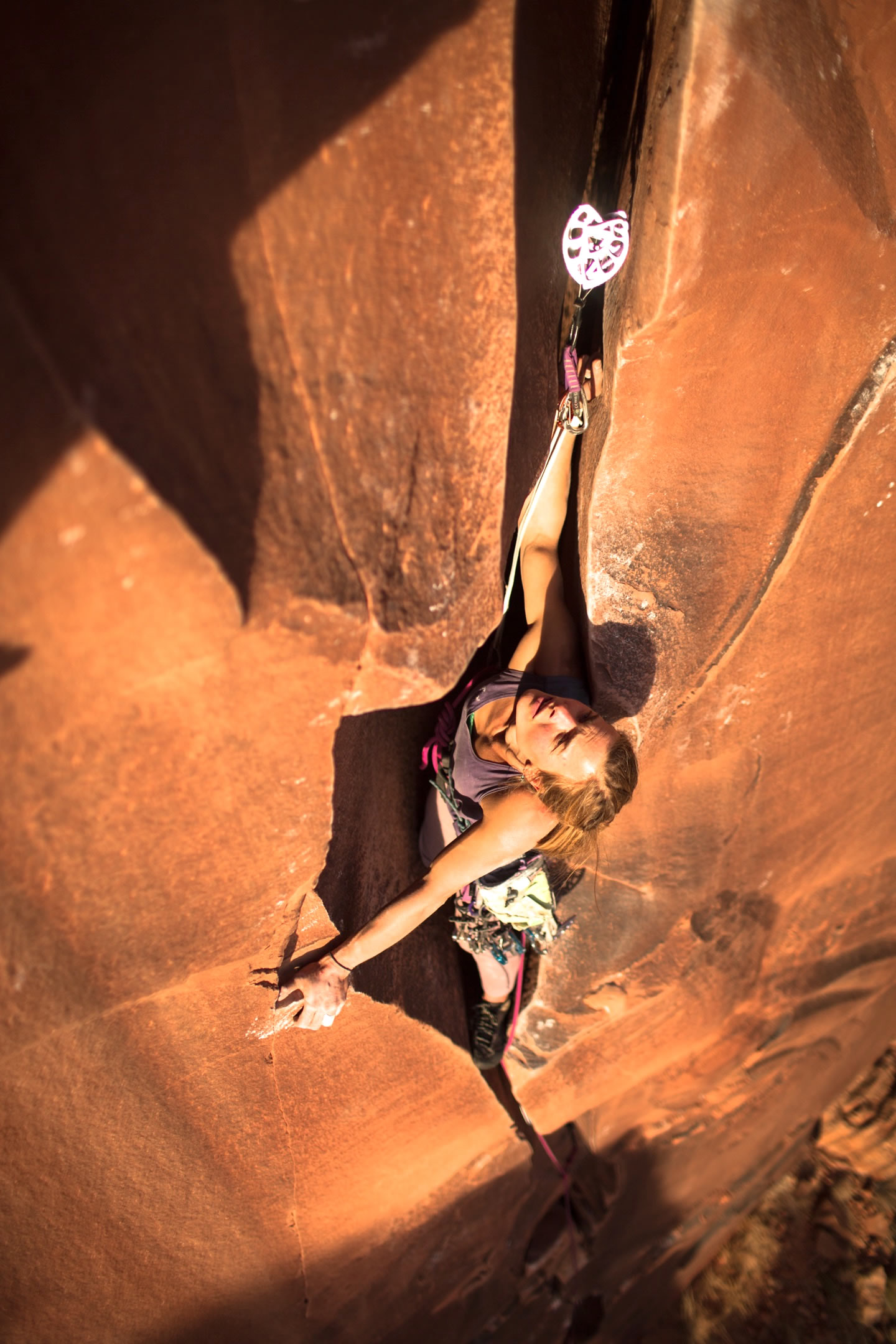 Indian Creek is known for its splitters, but that doesn't mean that every climb is the same. Face holds, pods, varying crack sizes, roofs, and other features make the climbing constantly challenging and thought provoking. Here I test all those skills on Broken Tooth (5.12). [Photo] Forest Woodward