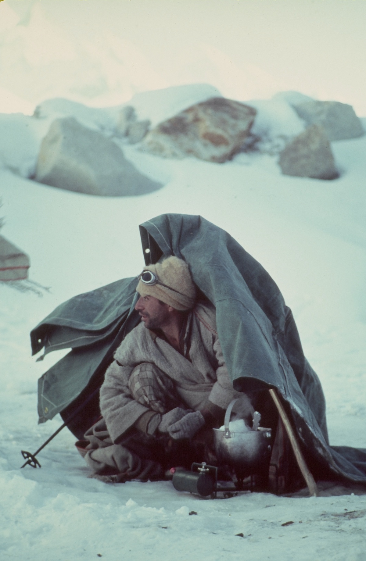 Unknown person taking shelter. [Photo] Photographer unknown, Kim Schmitz collection