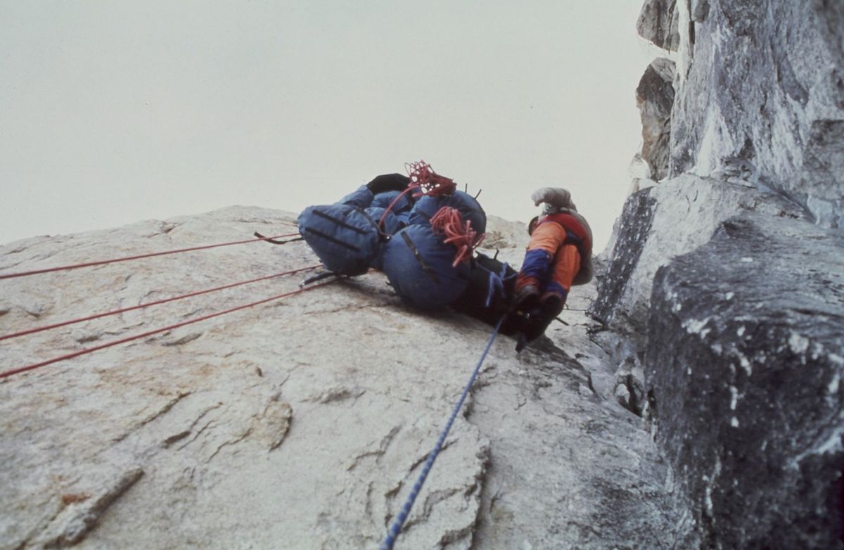 Kim with team haulbags on Uli Biaho, Pakistan, 1979 [Photo] John Roskelley, Kim Schmitz collection
