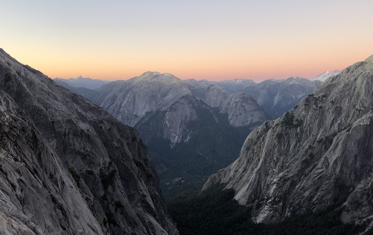 The Austral sunset lights up the Cochamo valley from high up on Cerro Walwalun. [Photo] Chris Kalman