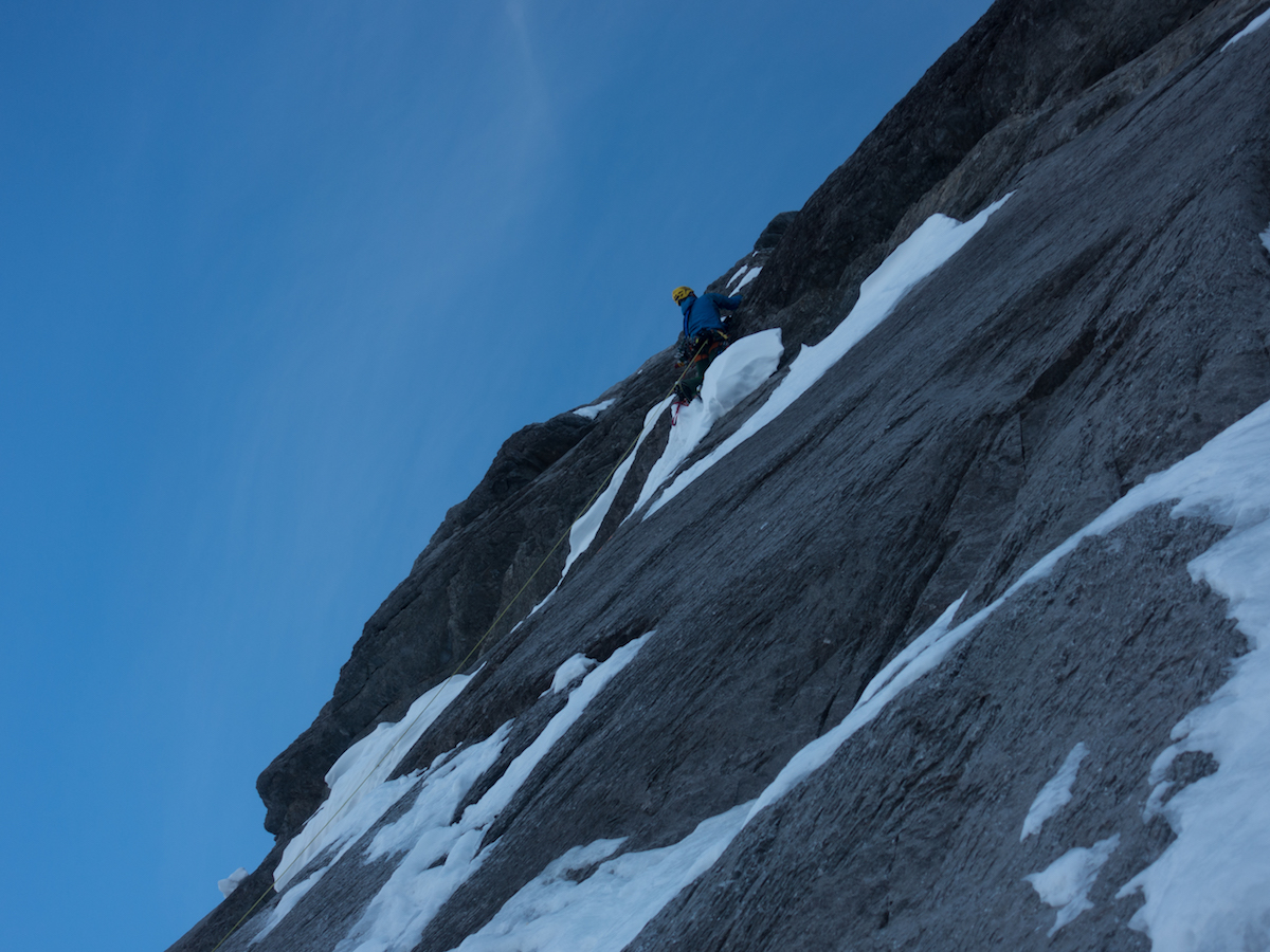 Roger Schaeli climbs the dry pitch straight up from the Hinterstossier Traverse where Metanoia breaks off from the Heckmair Route. Stephan Siegrist said Schaeli took two hours to lead the pitch with mixed and aid climbing, and that more snow and ice would make the section easier. [Photo] Archive Metanoia