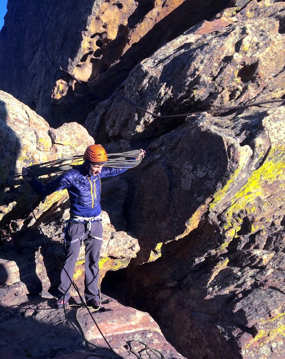Though too small to pull over a helmet, the low-profile hood did well underneath. Stretch panels over the ears meant commands were easy to hear, but the extra insulation would have been welcome on windy days such as this one in Eldorado Canyon. [Photo] Corey Buhay