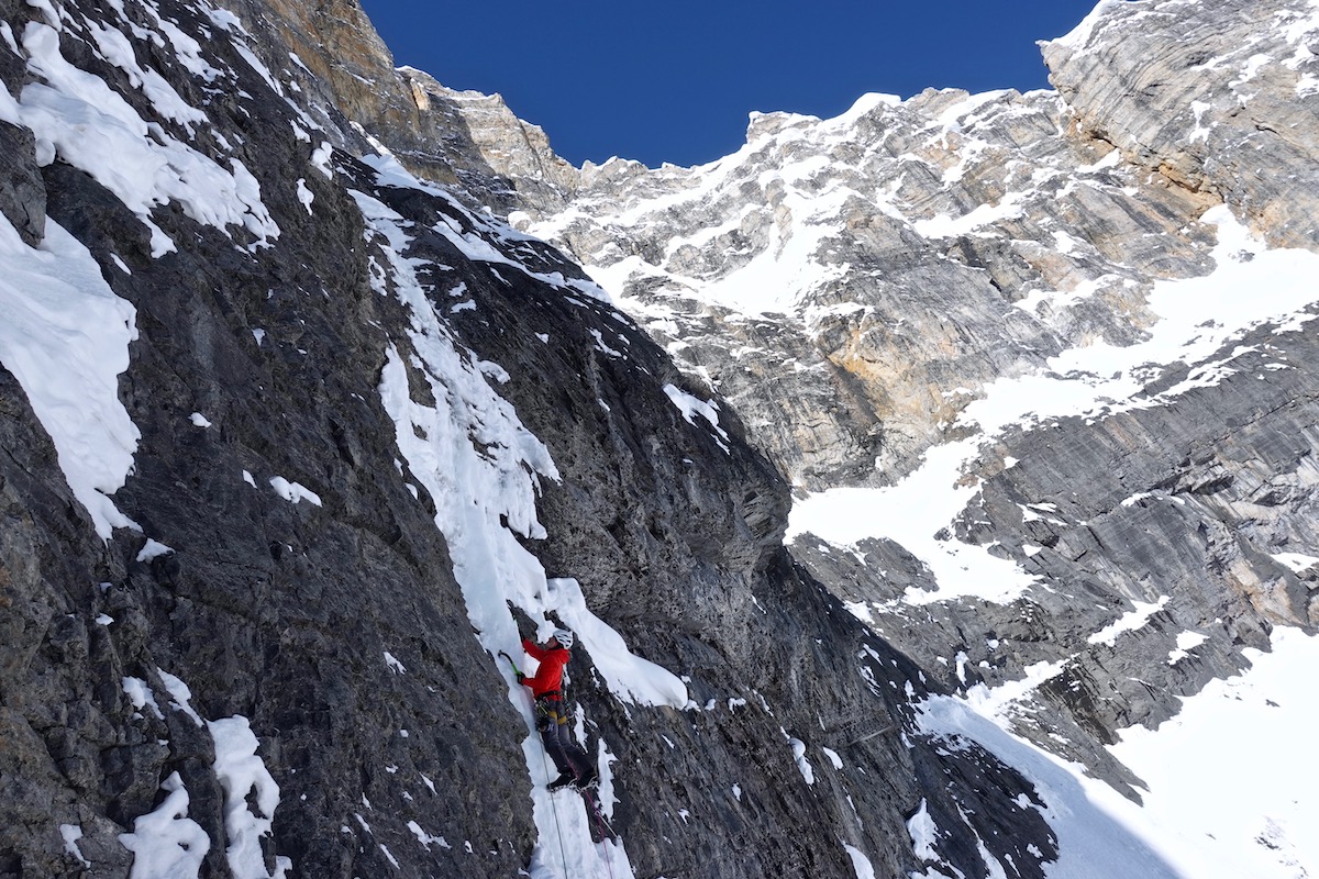 Lindic attempts to climb a column of steep snow in search of access to the headwall. [Photo] Courtesy of Ines Papert, Luka Lindic and Brette Harrington