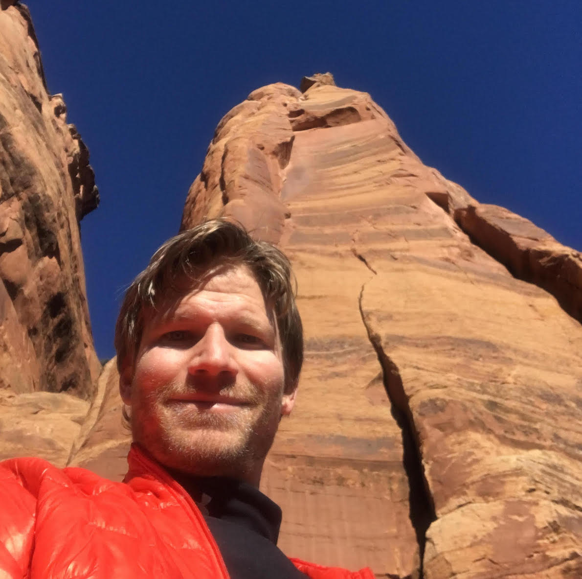 The author at the base of Grand View Spire in Colorado National Monument before rope soloing Relics (5.10 C2, 400'). [Photo] Derek Franz