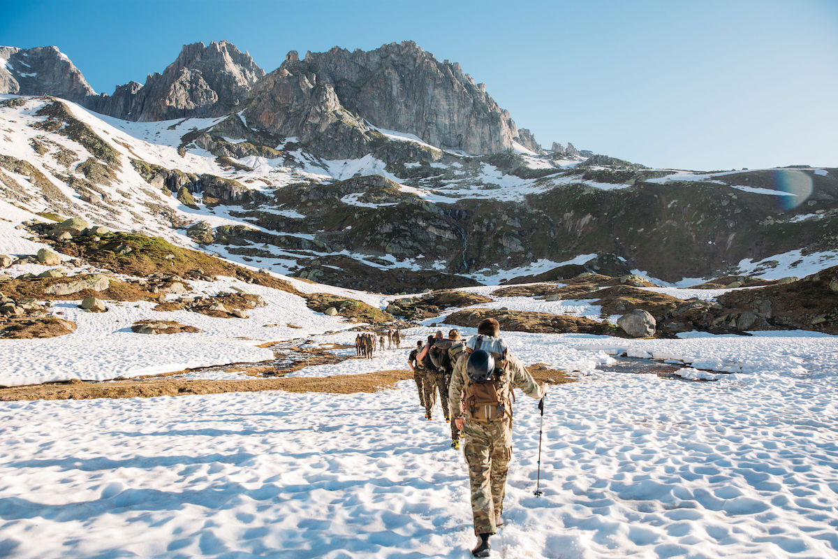 The author Nathan Fry and his fellow classmates approach the Chli Bielenhorn, located near the famous Furka Pass (Furkastrasse) road during the 2019 NATO Partnership for Peace Program in Switzerland. [Photo] Tyler Casey