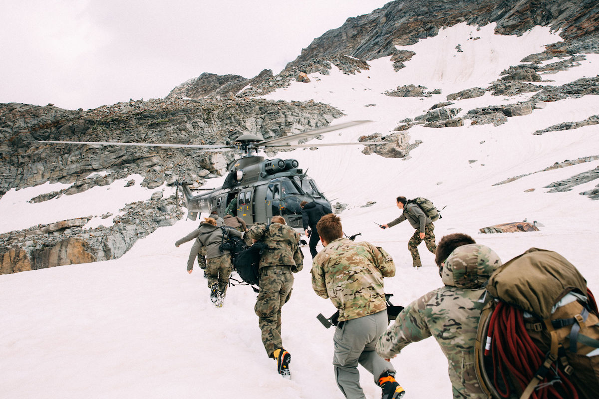 Fry and his cohorts run aboard a helicopter. [Photo] Tyler Casey