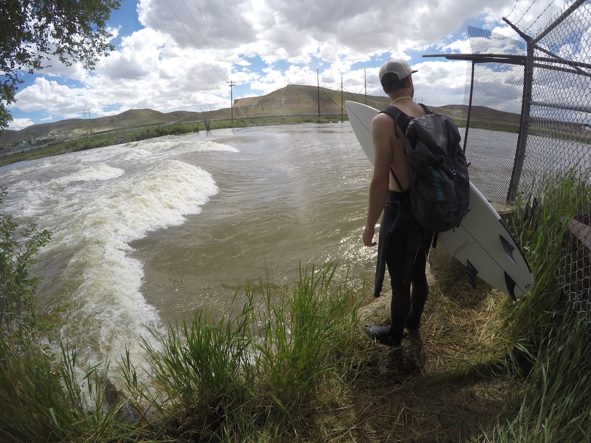 The author scopes the local Rocky Mountain surf break, loaded up with snacks and wax. [Photo] John Easterling collection