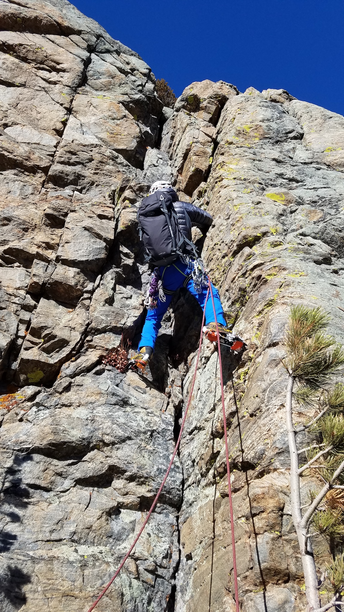 Mike Lewis guides two clients up a mixed route on the East Glacier Knobs, Rocky Mountain National Park, Colorado. [Photo] Will Fenwick