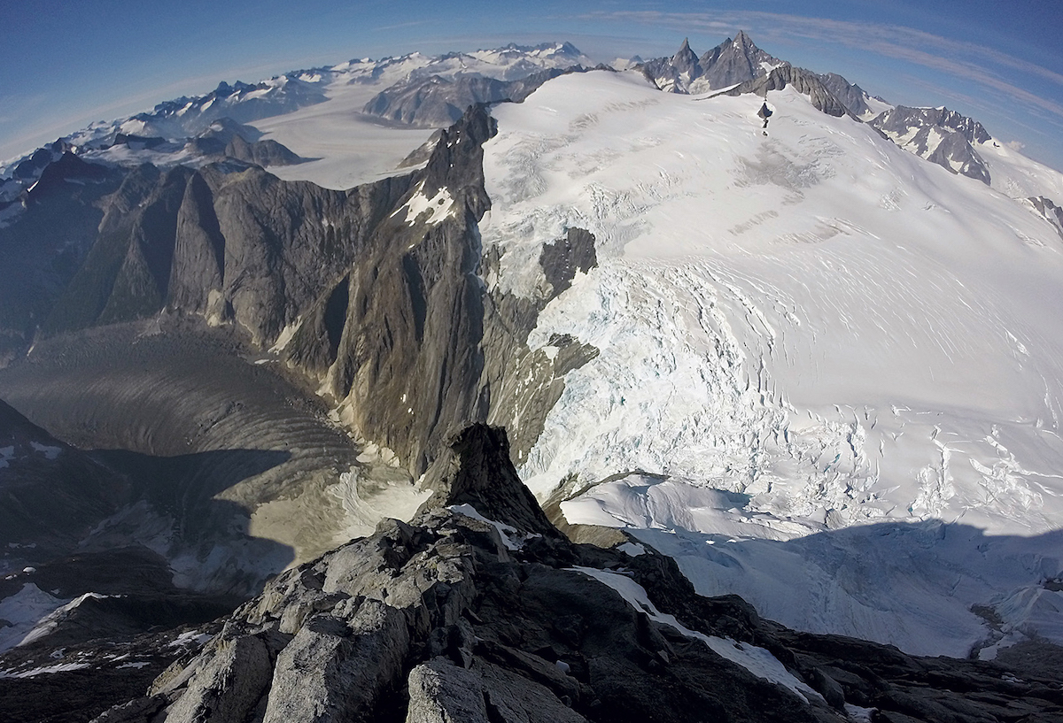 The view from the route on the North Pillar, with the Witches Cauldron below and Mt. Burkett visible to the right.  [Photo] Cole Taylor