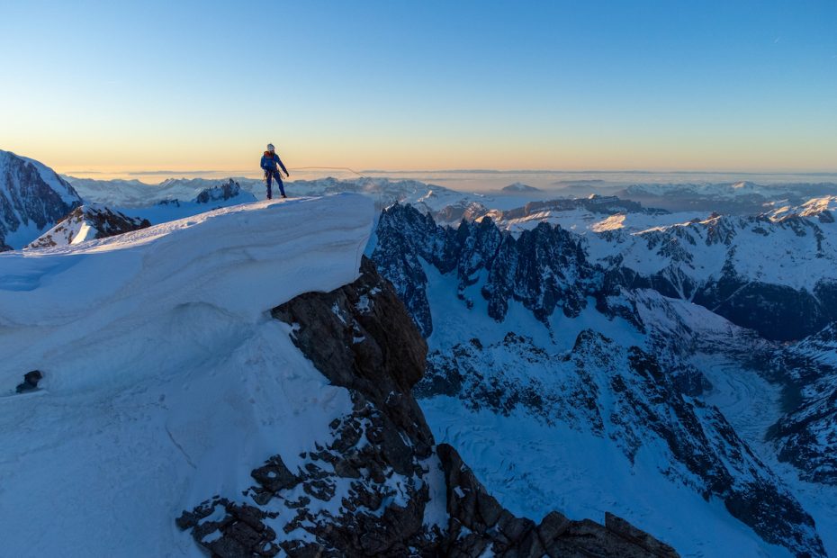 Charles Dubouloz summits the Walker Spur of the Grandes Jorasses after soloing Rolling Stones (5.10 A3, or M8, 1100m) over six days in January. [Photo] Seb Montaz Studio (@sebmontazstudio)