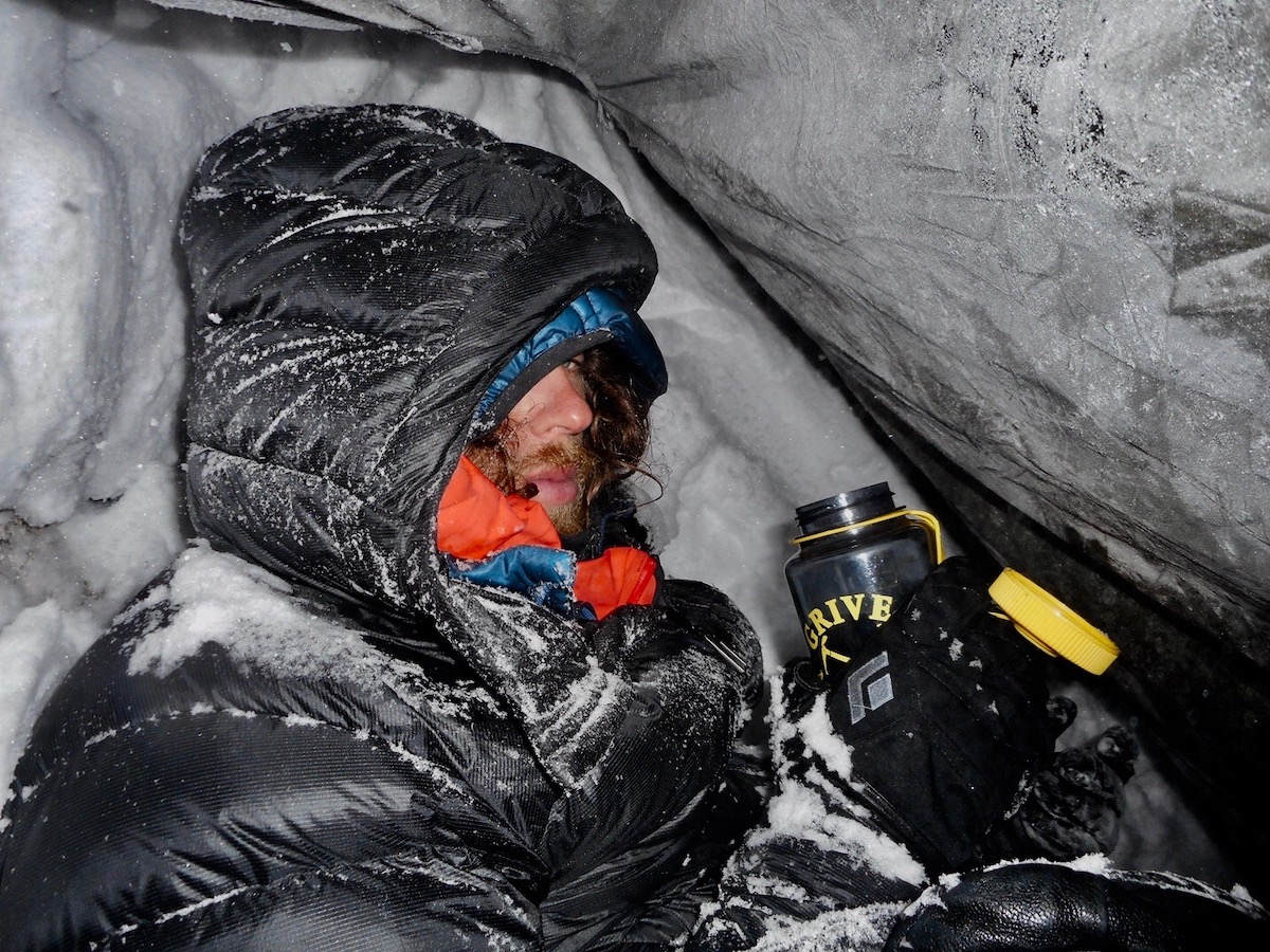 The second bivy. Rousseau writes: We gave up sleeping; this is a photo I took of Jackson while we were waiting for the sun. [Photo] Alan Rousseau