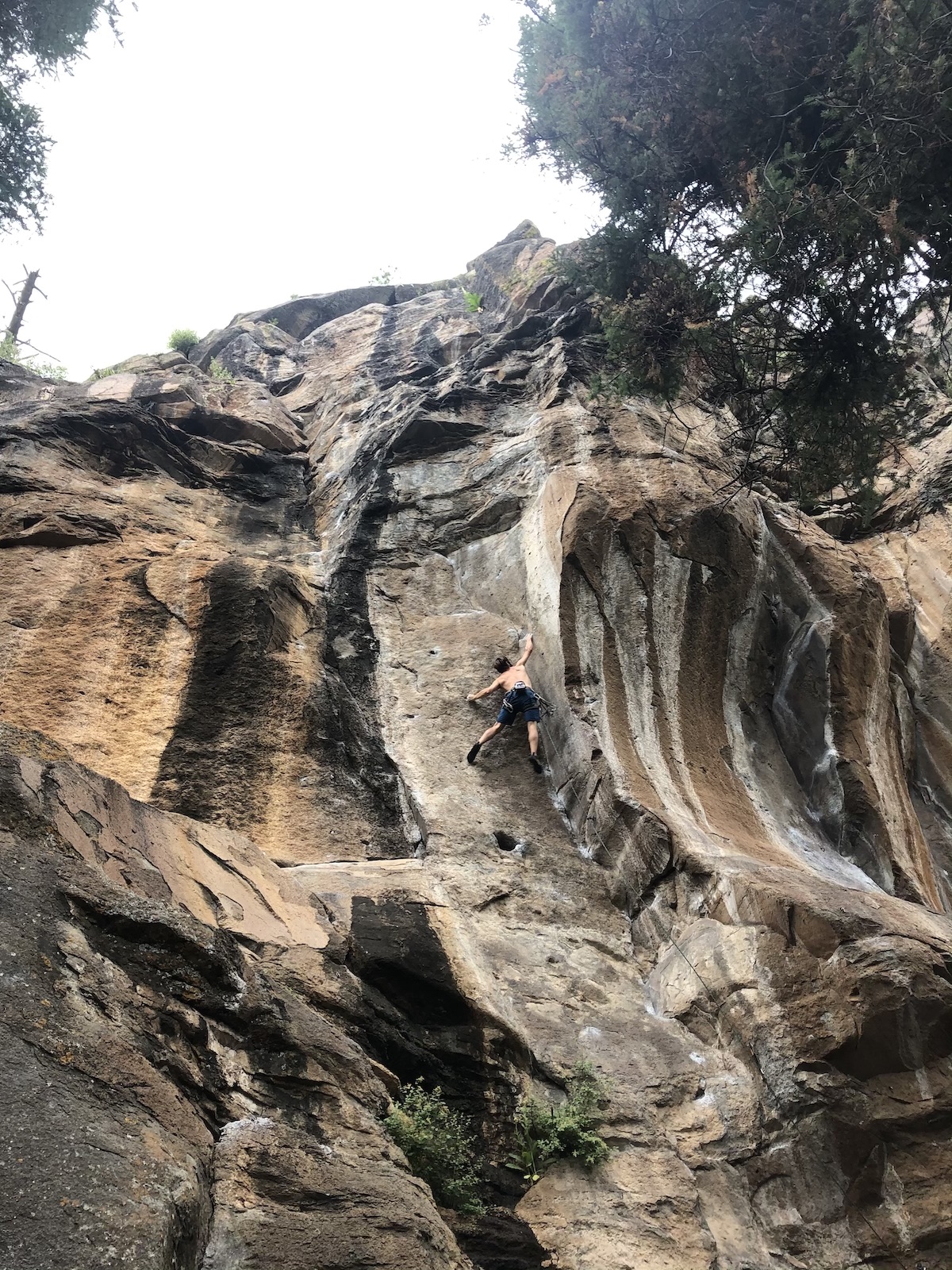 Chris Kalman climbing Up In Smoke (5.12) at The Peaks Crag in Flagstaff, Arizona. The pitch has a little bit of everything, from thin face, to stemming, to corner crack climbing, and even some delicate toe-tapping through a panel of small shallow pockets. The Scarpa Maestro excelled on all counts. [Photo] James Q Martin