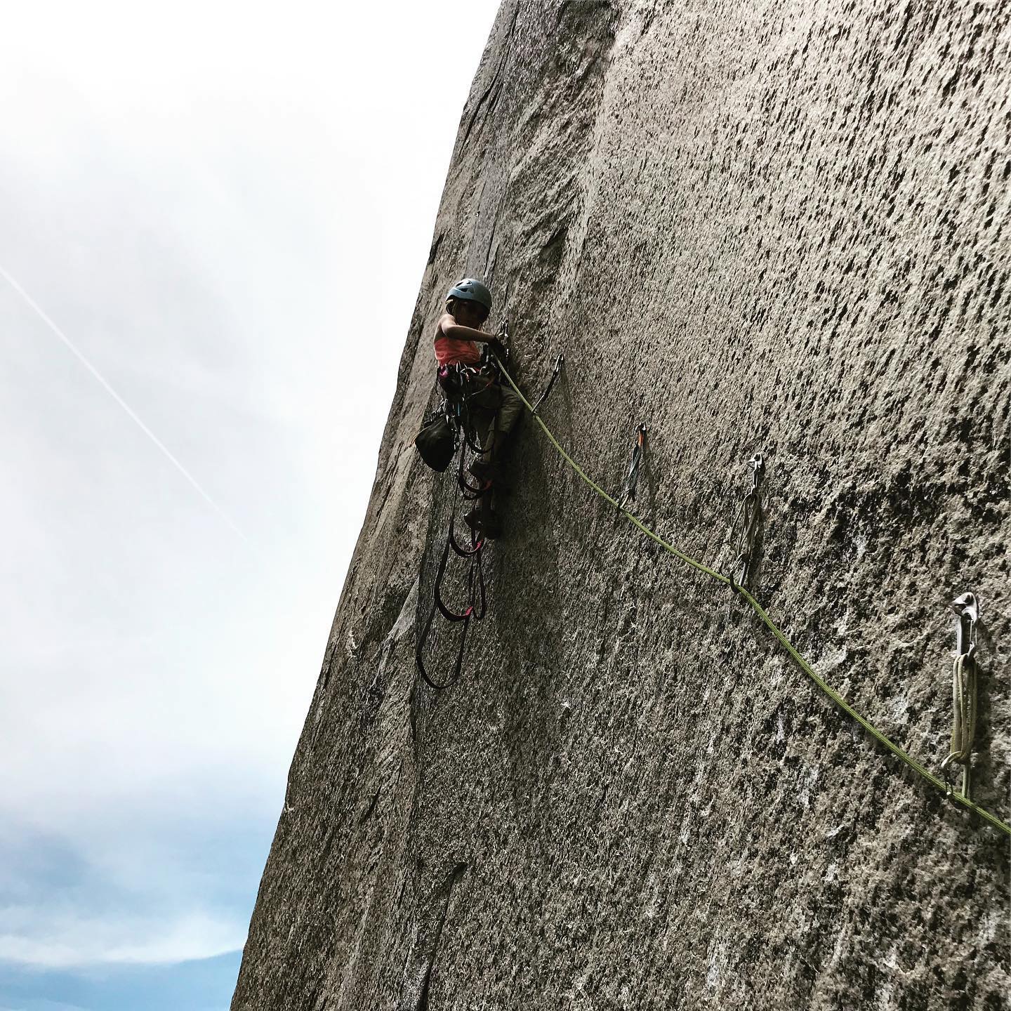 Ten-year-old Selah Schneiter leads the bolt ladder to Boot Flake on the Nose, El Capitan, Yosemite. [Photo] Schneiter family collection