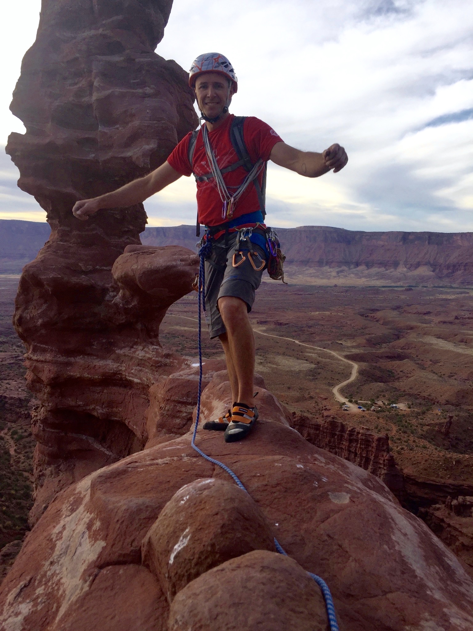 Mike Lewis prepares to walk the sidewalk on Ancient Art near Moab, Utah. [Photo] Drew Maloney